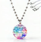 Chaolr LED disco-ball necklace with silver-tone chain, multicolor pendant and USB charging cable on a white background